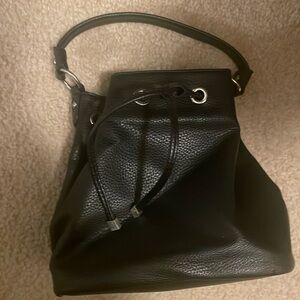 Bucket style cross body bag